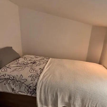 Sn